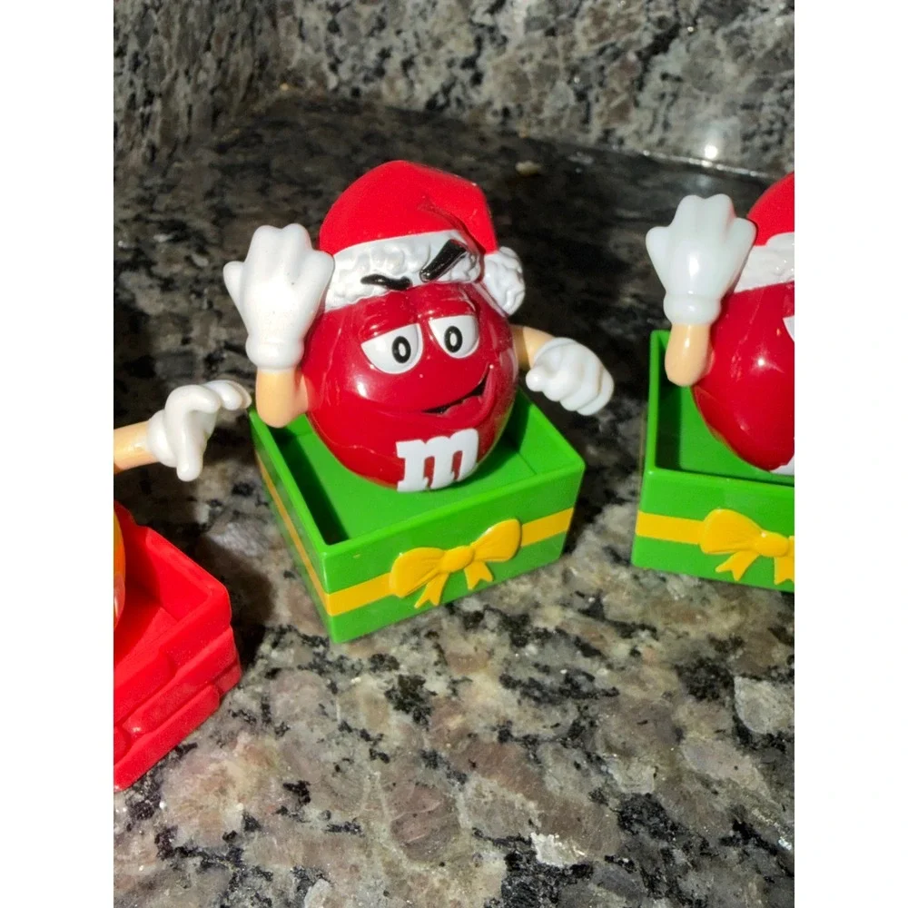 M&M's Christmas Holiday Figurines Red and Yellow Santa Hat Gift Box Set of 4